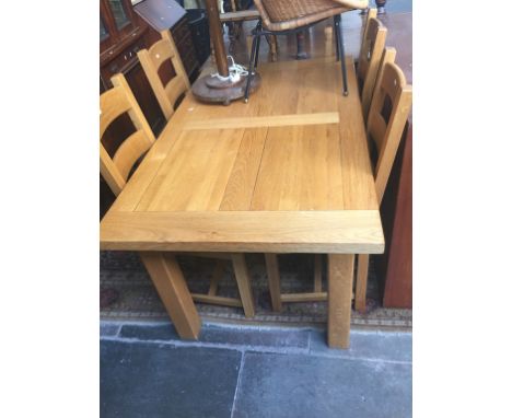 LIGHT OAK TABLE AND FOUR LADDER BACK CHAIRS