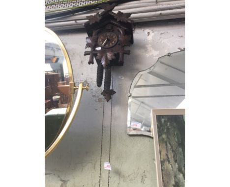 CUCKOO CLOCK AND ANOTHER WALLCLOCK