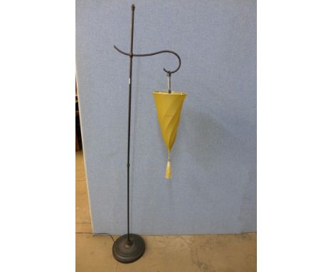 A metal standard lamp
