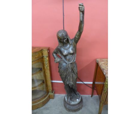 A large bronzed figural Cleopatra lamp stand