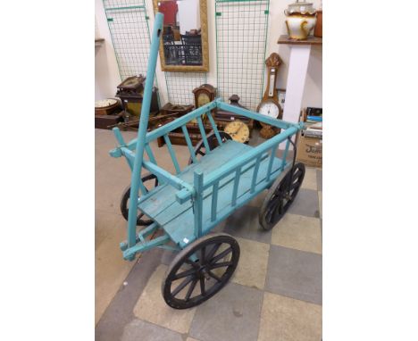 A vintage painted wooden cart