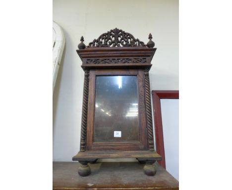 A carved beech bracket clock case