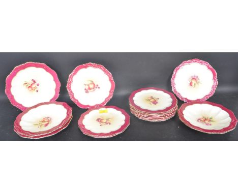 A collection of vintage 20th century Paragon China having a burgundy border with raised floral decoration with a central pane