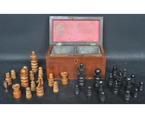 A 20th century carved pine and ebonised wood chess set together with a 19th century Victorian inlaid double compartment tea c