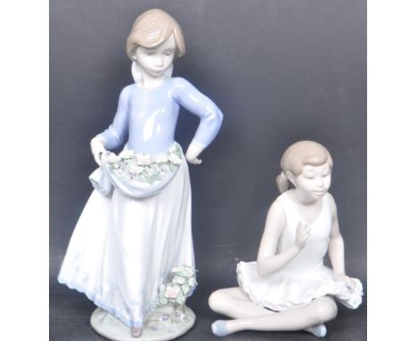 A pair of vintage 20th century Spanish china porcelain figurines to include a Lladro figurine of a girl holding flowers in th