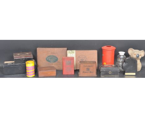 A collection of vintage 20th century money boxes and cigar boxes to include a novelty koala money box, a Lloyds bank money bo