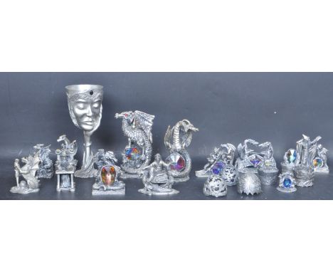 A collection of vintage 20th century Myth and Magic spelter and crystal figures to include The Powerful Dragon, The Dragon of