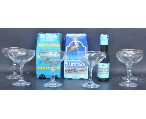 A collection of vintage retro Babycham coupe advertising glasses having the Babysham print &amp; deer to the base. Together w