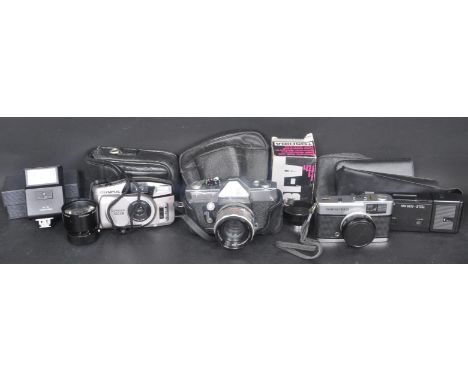 A collection of vintage 20th century camera equipment to include an Olympus Zoom F9-27mm lens, Petri film camera, Olymous Tri