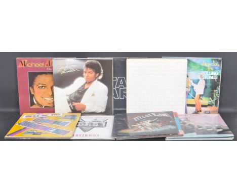 A large collection of vintage 20th century vinyl LP records to include Eurythmics, Bladerunner, Madness, Meatloaf, OMD, Polic