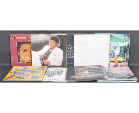 A large collection of vintage 20th century vinyl LP records to include Eurythmics, Bladerunner, Madness, Meatloaf, OMD, Polic