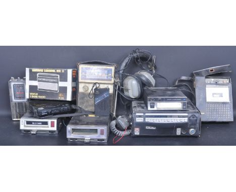 An assortment of vintage retro 20th century audio equipment to include a Mustang car radio, a boxed Harvard Carnival MK II Ra