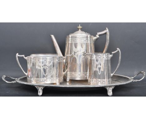 An early 20th century Atkins Brothers of Sheffield silver plate tea service comprising of a coffee pot, a sugar bowl and a cr