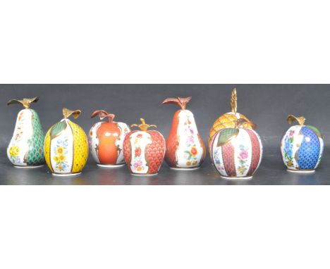 A collection of eight vintage 20th century Royal Worcester Connoisseur Collection fruit candle snuffers to include a peach,a 