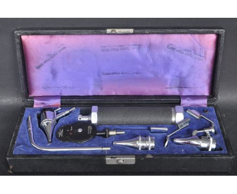 Of Medical Interest - A vintage 20th century Gowlands Otoscope Ophthalmoscope having chrome metal attachments . Comes in a ha