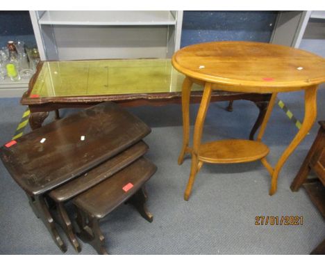 A Long John coffee table with leather inset scriber having cabriole legs and a carved frieze together with an oak occasional 