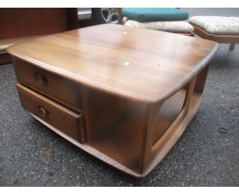 An Ercol elm Golden Dawn Pandora coffee table, 39 x 80 x 80cm