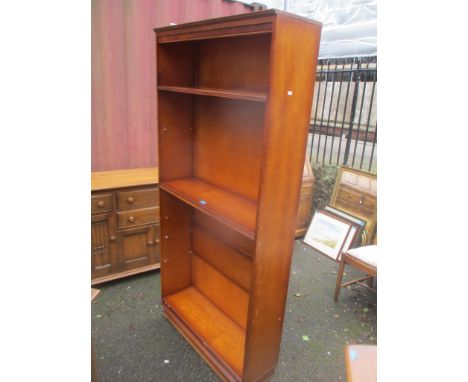 A modern open book shelf with dentil moulding and six adjustable shelves 195 x 91 x 29.5cm, together with a mahogany open loc