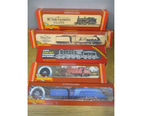 Five boxed OO Gauge Hornby locomotives to include a R.372 Seagull, R.055 2-6-4 Tank, R.150 Class B12 locomotive and tender R.