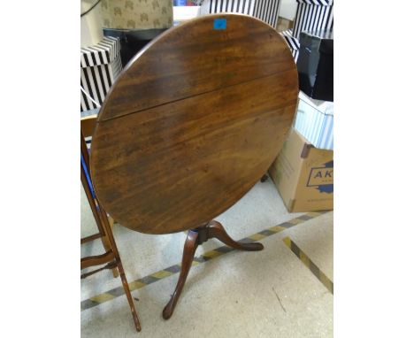 A 19th Century mahogany tilt top table on a tripod base, 69.5cm high, 80cm diameter