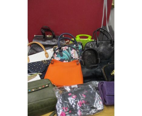 A quantity of fashion bags to include Osprey, David Jones and Accessorize, together with a retro Smith Corona turquoise colou
