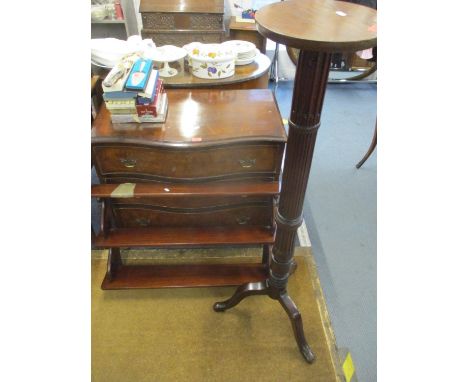 A mahogany three tier open wall shelf unit with scrolled supports together with an early 20th century mahogany torchere on tr
