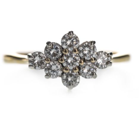 DIAMOND CLUSTER RING, set with round brilliant cut diamonds totalling approximately 0.70 carats, in eighteen carat gold, size