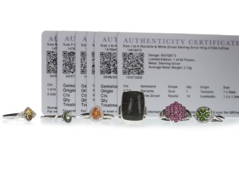 SIX GEM SET SILVER RINGS, comprising a Marialite, Andamooka opal, Chrome tourmaline, Cruzerio Rubellite, Moldavite and a Mand