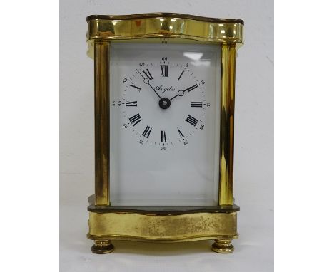Mid 20th century carriage clock in brass case, the white face with Roman numerals marked 'Angelus'