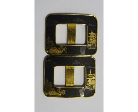 A pair of Japanese niello buckles, c.1930, in gold and black with mountain and pagoda scenes, mark to reverseCondition Report