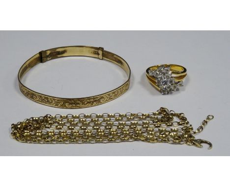 Gold coloured and white stone cluster ring marked 14k, a 9ct rolled gold bangle and a gold coloured chain necklace (3)