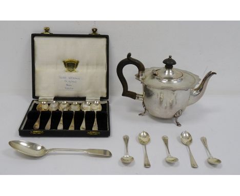 Early 20th century silver teapot with wooden handle and finial, of plain form with shaped edge and spade feet, Birmingham 190