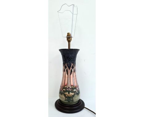 Moorcroft pottery table lamp, squat baluster-shaped and having tube-lined hibiscus decoration, stepped wooden base, 18cm high