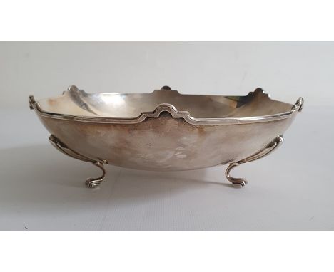 Silver footed presentation bowl by William Hair Haseler, Birmingham 1936, with arched rim, the interior engraved 'Best wishes