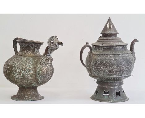 Two Asian copper tea kettles, each of globular form, the first with cover and spire finial, the first decorated in repousse w