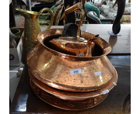 Copper kettle, a brass pitcher, two copper bowls and an embossed copper platter (5) 