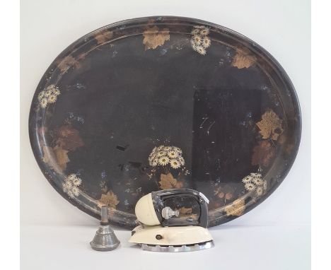 Oval papier mache painted tray, 25cm wide and a vintage "Tilley" paraffin domestic iron with original instructions (2) 