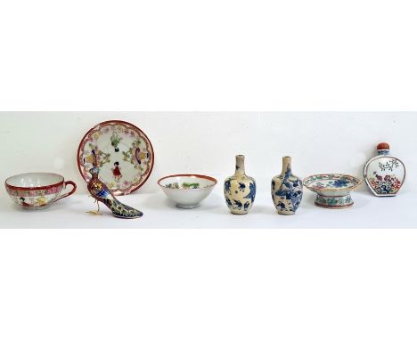 Group of Asian porcelain and enamel, comprising a Chinese porcelain compressed snuff bottle and hardstone cover, enamelled wi