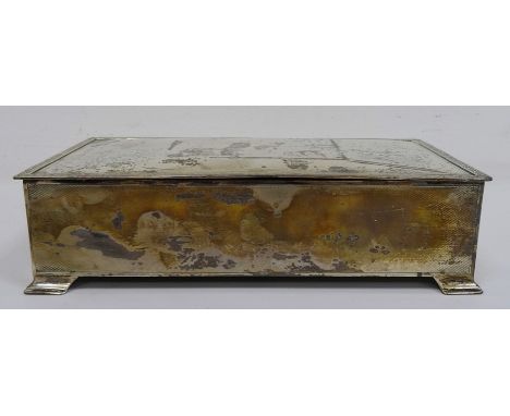 1930's silver-mounted rectangular box with clover and scroll relief decoration to lid edge, with engine-turned decoration, on