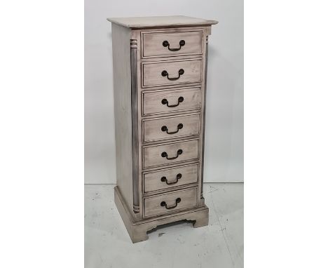 20th century narrow painted chest&nbsp;of seven drawers with fluted column pilasters raised on bracket feet, 50.5 x 129cm