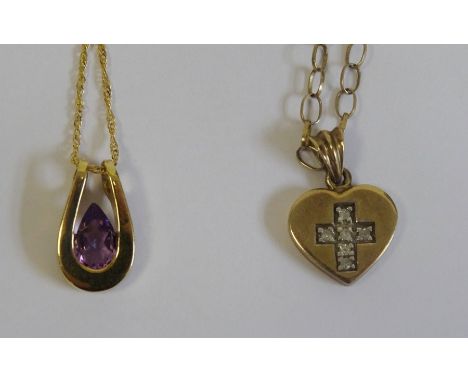 9ct gold heart-shaped pendant set with diamonds in a crucifix, on 9ct gold chain and a 9ct gold pendant set with pear-shaped 