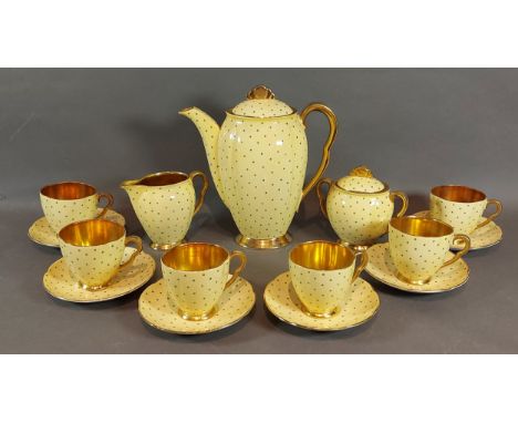 A Carlton Ware coffee service decorated with cream ground and high lighted in gilt together with a Royal Worcester covered di