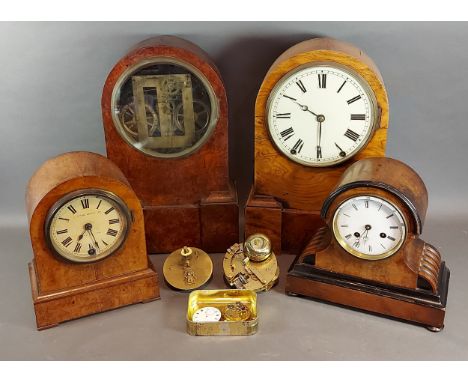 A Victorian walnut cased mantel clock, the movement stamped Japy Freres together with three other mantel clock, two clock mov