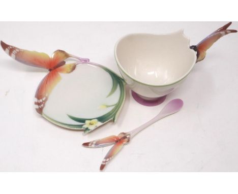 Franz butterfly teacup with saucer and spoon. No visible chips or cracks. P&amp;P Group 2 (£18+VAT for the first lot and £3+V