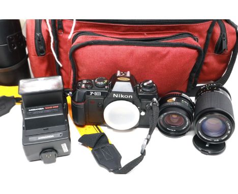 Nikon F301 SLR camera body with Miranda lens, with further lenses and bag. P&amp;P Group 2 (£18+VAT for the first lot and £3+