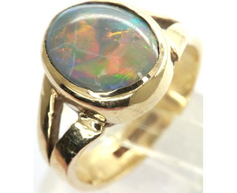 9ct gold opal set ring, size L, drop 10mm, 4.1g. P&amp;P Group 1 (£14+VAT for the first lot and £1+VAT for subsequent lots) 