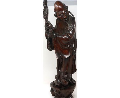 Carved hardwood statue of Shou Lao (Shou Xing) Taoist God of Longevity, standing on a bat, H: 60 cm. P&amp;P Group 3 (£25+VAT