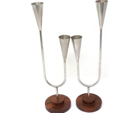Pair of mid century Lundtofte Danish stainless steel candle holders with original labels on both, H: 32 cm. P&amp;P Group 1 (