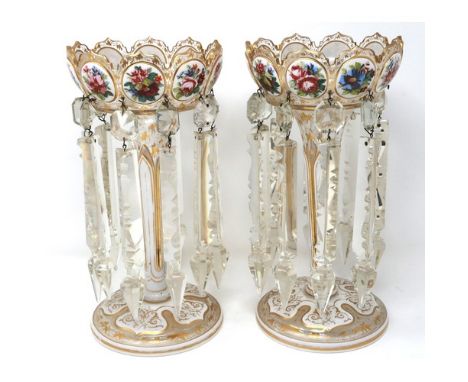 Pair of Victorian glass lustres, H: 30 cm, decorated with white enamelled and painted oval panels, profusely gilt throughout.