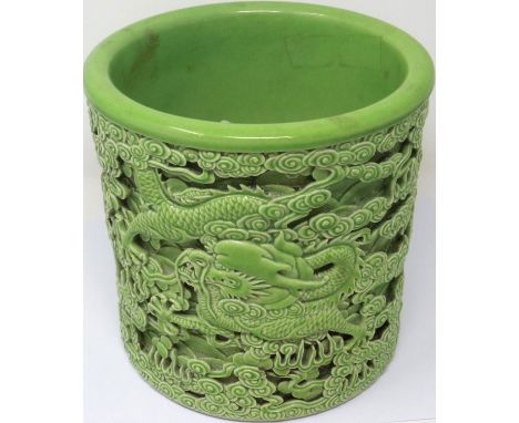 Reticulated green ceramic Chinese brush pot with dragon decoration in relief, H: 18 cm, no cracks or chips, crazed throughout